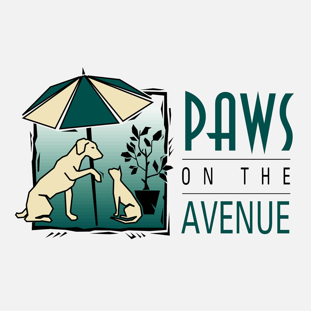 Paws on the Avenue is a pet store specializing in natural pet food, gifts, and accessories. The logo is a graphic of a dog and a cat in an outdoor cafe setting.